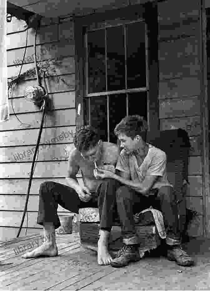 A Black And White Photograph Of A Young Boy Sitting On A Porch Swing. Spitfire Ace Of Aces: The Album: The Photographs Of Johnnie Johnson