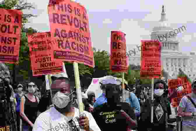 A Powerful Image Of A Sanctuary Movement Protest, With Protestors Holding Signs And Marching Together Father Luis Olivares A Biography: Faith Politics And The Origins Of The Sanctuary Movement In Los Angeles