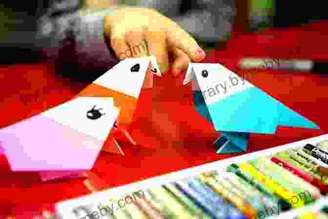 Child Folding A Vibrant Origami Bird Best Summer Ever: A Summer S Worth Of Fun Inexpensive Art Learning Projects To Occupy Kids 6 11 At Home For Hours At A Time