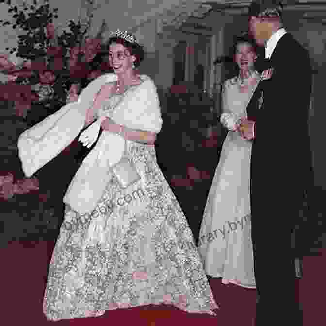 Queen Elizabeth II In A Flowing White Evening Gown With Intricate Beading And A Tiara The Crown In Vogue