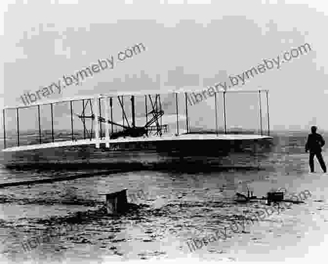 The Wright Flyer Taking Off At Kitty Hawk On December 17, 1903, Captured By John T. Daniels First In Flight: How A Photograph Captured The Takeoff Of The Wright Brothers Flyer (Captured History)