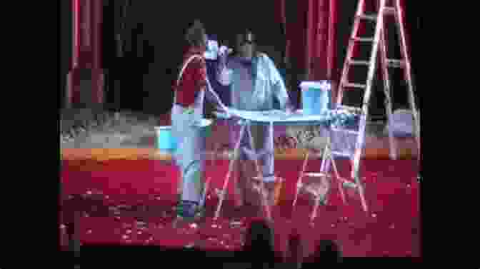 Two Clowns Engaging In A Slapstick Routine, Highlighting The Physicality And Exaggerated Movements That Define Physical Comedy. Discovering The Clown Or The Funny Of Good Acting